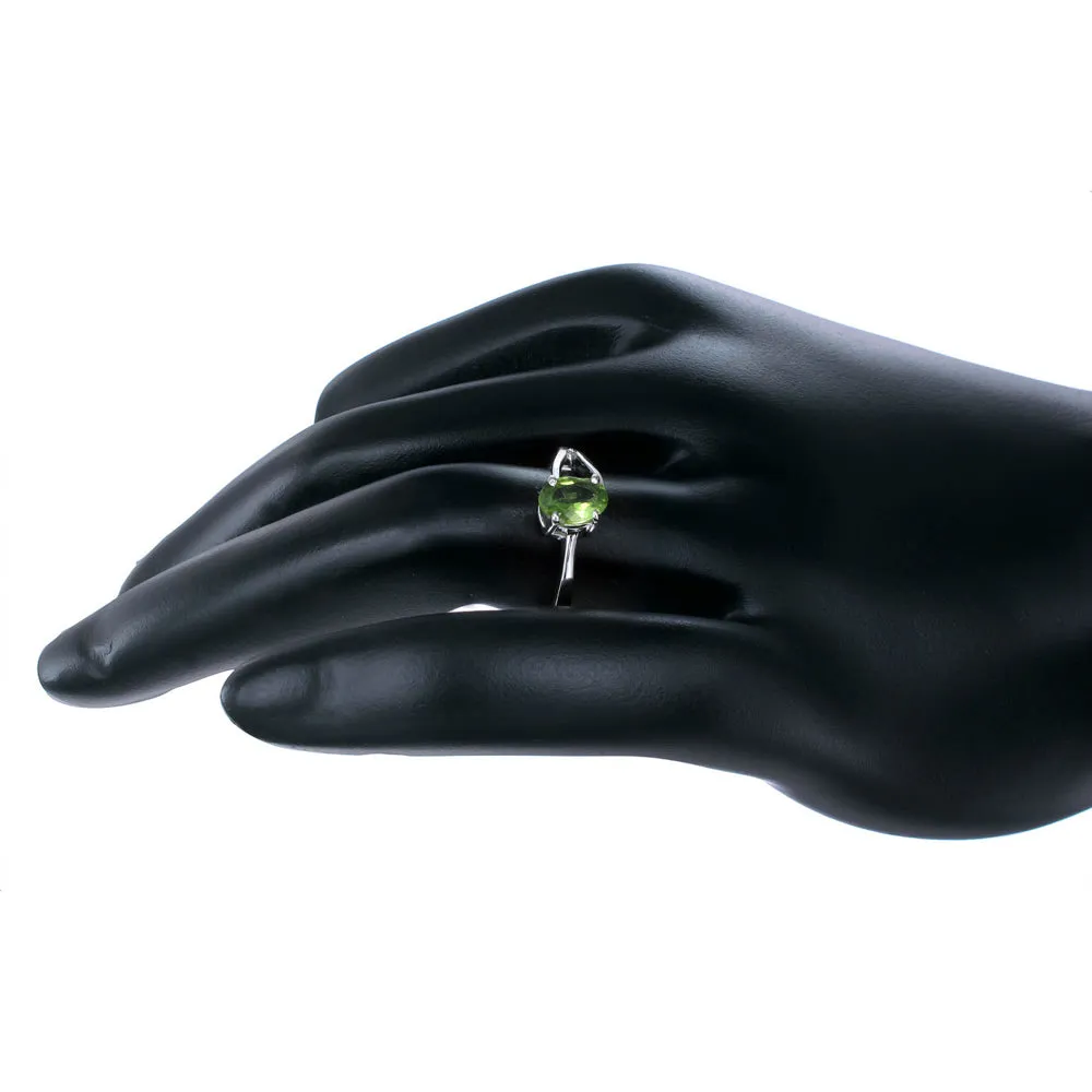 0.70 cttw Oval Shape Peridot Ring in .925 Sterling Silver with Rhodium Plating