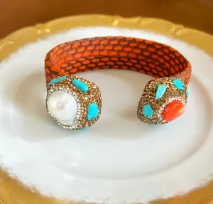 Fabulous statement cuff bracelet with an orange faux skin style banding